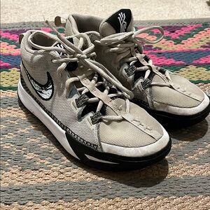 Light Gray High-Top Sneakers with Traditional Lacing and Soft Material